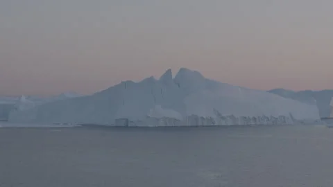 4K Still Shot of Massive Iceberg at Sunset Stock Footage 314514056