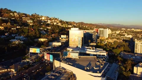 4K Stock Video 5 SUNSET BLVD Aerial Footage Pan Left To Traffic Cars Buildin Stock Footage 194748387