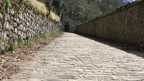 4k Stone path leading to the Cappella degli Uccelli, Birds Chapel, Stock Footage 75191349