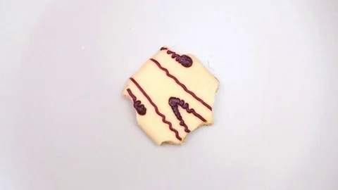 4K Stop Motion Animation Cookie Eaten Bite by Bite Stock Footage 71690889