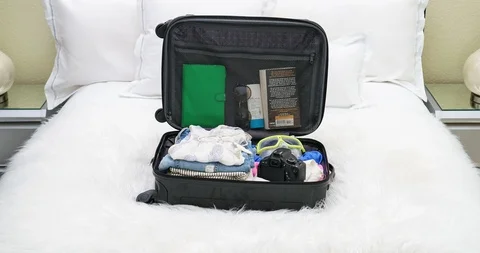 4K Stop Motion Animation Of Empty Suitcase Being Filled Up With Women's Clothes Stock Footage 86400128