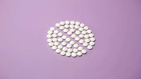 4K Stop motion animation loop of white pill on lilac background Stock Footage 159617810
