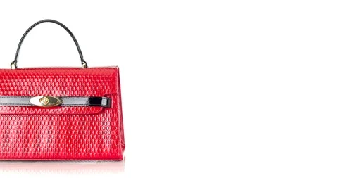 4K stop motion animation of red handbag moving on white background Vídeos de archivo 86338017