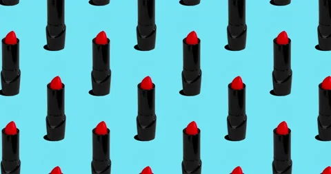 4K stop motion animation, red lipsticks falling down on blue background Vídeos de archivo 166979556