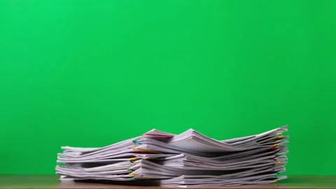 4K Stop of motion close-up stack overload document report paper Stock Footage 140858825
