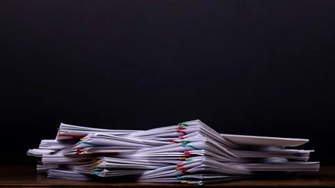 4K Stop motion of close-up stack overload document report paper Stock Footage 142652766