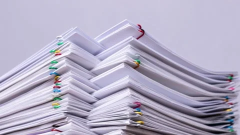 4K Stop motion of close-up stack overload document report paper Stock Footage 150955149