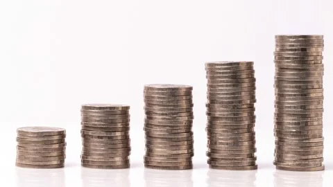 4k stop motion five piles of gold money coins decreasing fading disappear Stock Footage 149765887