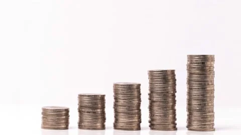 4k stop motion five piles of gold money coins Stock Footage 151844080