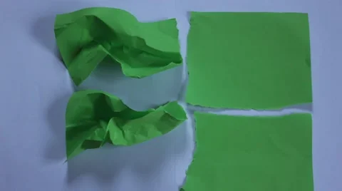 4K stop motion green paper opening Stock Footage 45696133