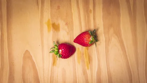 4K stop motion loop of two strawberries getting closer together and apart. Stock Footage 130793523