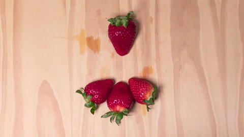 4K stop motion loop video of juicy strawberries appearing ain a circle. Stock Footage 130793512