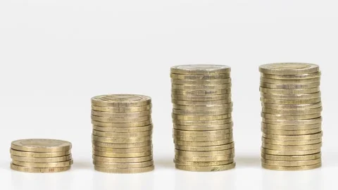 4k stop motion piles of gold money coins decreasing fading disappear Stock Footage 177958849