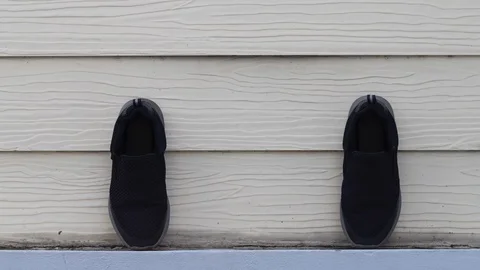 4k Stop motion Shoes to keep social distancing Stock Footage 129758604