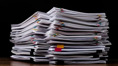 4K-Stop motion Stack overload document report paper Video stock 121210762