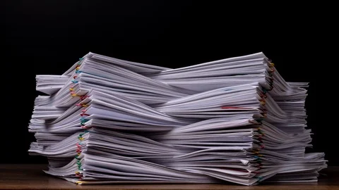 4K Stop motion of Stack overload document report paper. Stock Footage 124739202