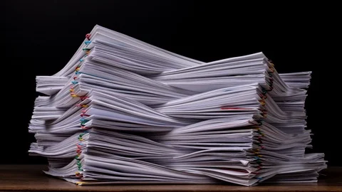 4k Stop motion of Stack overload document report paper. Stock Footage 124739294