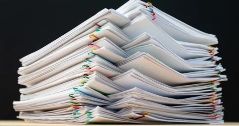 4K Stop of motion stack overload document report paper Video stock 134472785