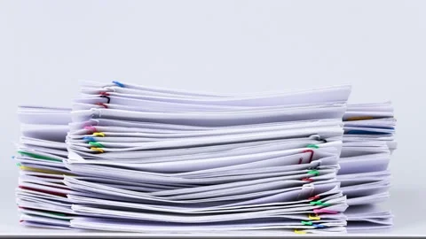 4K-Stop motion Stack overload document report paper Stock Footage 177961455