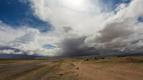 4K. Storm clouds before rain in the Gobi Desert, Mongolia. Ultra HD, 4096x230 Stock Footage 73917691