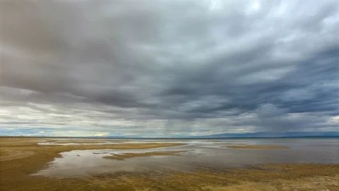4K. Storm clouds before rain in the salted lake Durgun Nuur, Mongolia. Ultr.. Stock Footage 73758153