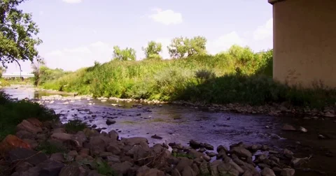 4K Stream Under Bridge Video stock 79897144