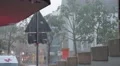 4k Street scene with heavy rain thunderstorm in german city 4k or 4k+ Resolution