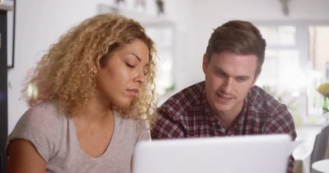 4K Stressed mixed ethnicity couple having an argument about household finances Stock Footage 114003871