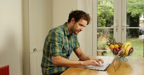4K Stressed out man working at home, trying to solve a problem on computer Stockbeeldmateriaal 80567381