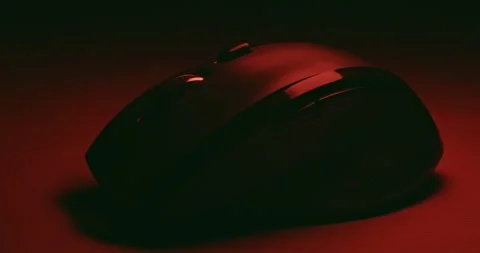 4K Striking View of a Mouse with Red Lights and Shadows on a Black Stock Footage 245443777