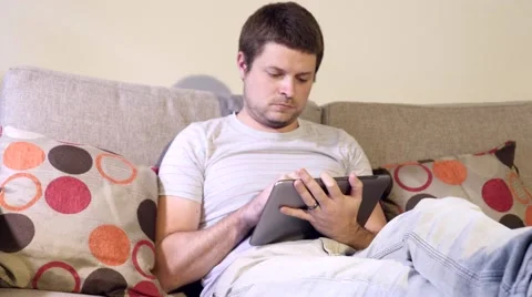 4k Student on Tablet Relaxing 库存影片 40316075