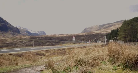 4K Student Trekker in The Glen Coe Scottish Mountains. Tourist Hiking. Stock Footage 93062166