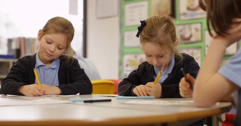 4k, Students taking an exam in a classroom. Slow motion. Stock Footage 74269717