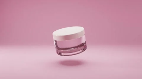 4K Studio View of Empty Glass Cosmetic Jar with White Screw Lid Stock Footage 332157255