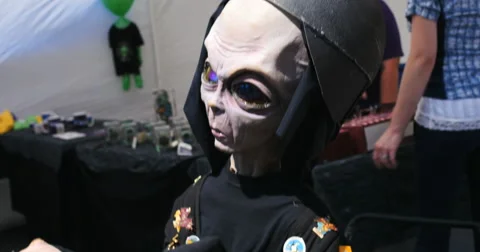 4K stuffed toy alien on motorcycle at UFO days festival roswell, New Mexico Stock Footage 54333151