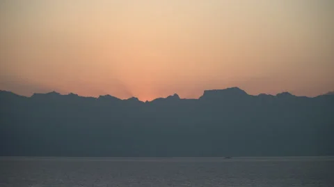 4K - Sun Rise Over Mountain And Lake Stock Footage 68040917