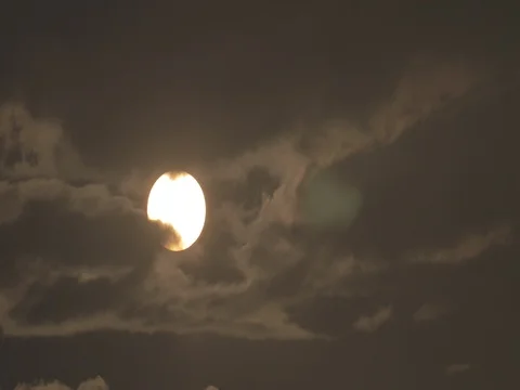 4k sun rising behind clouds at dawn timelapse Video stock 75961049