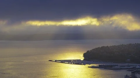4K Sun sets over Seattle Elliot Bay  Stock Footage 73461613