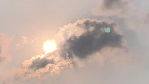 4K Sunlight Rays Through Towering Clouds With Slow Pan in Jakarta Stock Footage 341548541