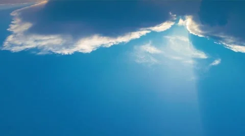 4K Sunray from Clouds in Clear Blue Sky Stock Footage 50235511
