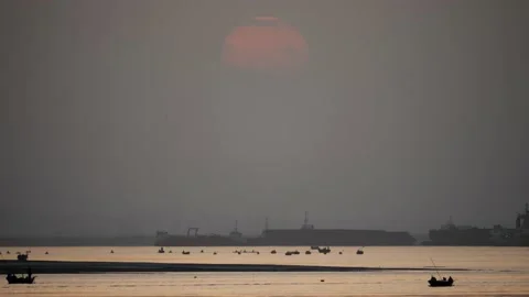 4K Sunrise By The Beach Stock Footage 141670262