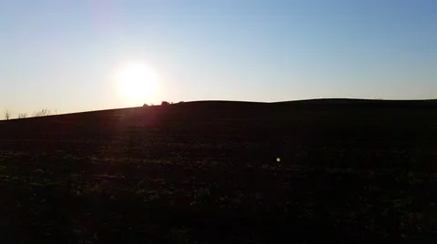 4K Sunset behind Field Stock Footage 49970956