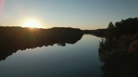 4K Sunset calm river panning up Video stock 218408195