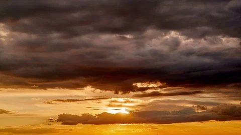 4K. Sunset clouds on the sky in horizon. Time-lapse. Stock Footage 74562674