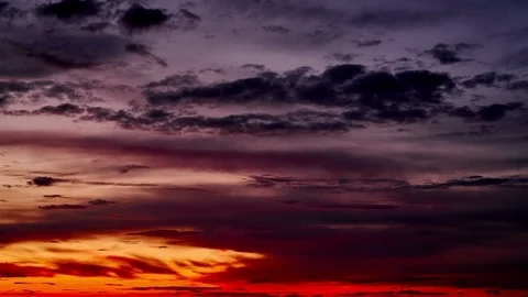 4K. Sunset clouds on the sky in horizon. Time-lapse. Stock Footage 74562732