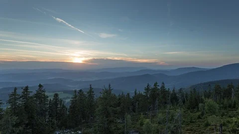 4K Sunset with forest and mountains view Stock Footage 125980548