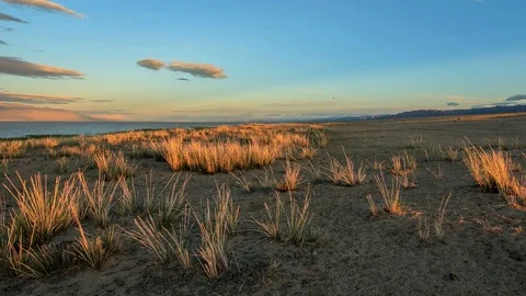 4K. Sunset on the lake Khar-Us Nuur, Mongolia. Ultra HD, 4096x2304 Video stock 73759544