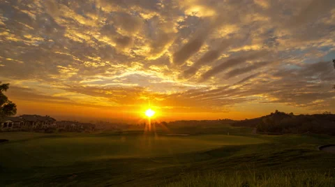 4k Sunset With Moving Clouds on Golf Course Stock Footage 66310180
