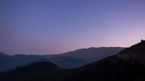 4K sunset to night Timelapse small village above mountains with milkeyway galaxy Stock-Footage 264151773