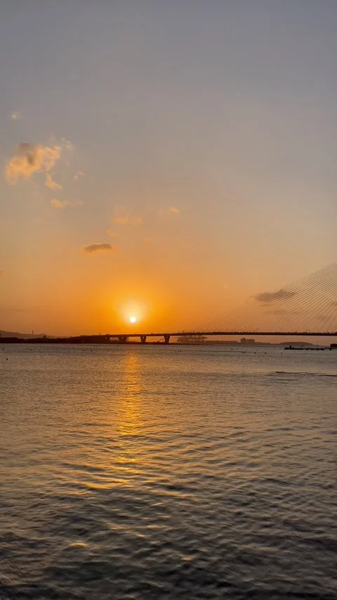 4K Sunset over Danjiang Bridge and Tamsui River in Taiwan-Portrait Video stock 328146006